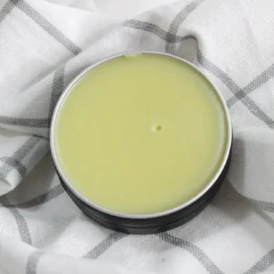 tin of homemade bug repellent balm