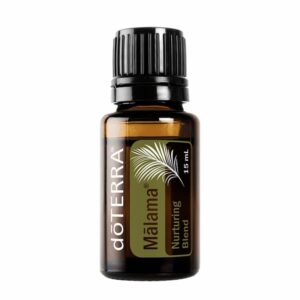 bottle of doTERRA Malama essential oil from Hawaii on white background