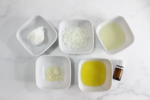 bowls of ingredients needed to make diiy tallow lip balm