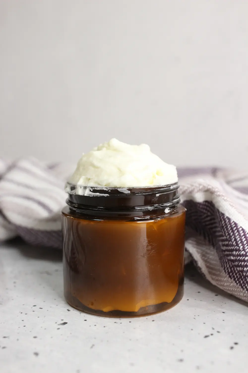 jar of natural homemade tallow body butter lotion