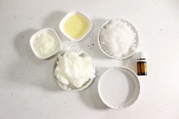 Magnesium Tallow Lotion Balm DIY Recipe 13 bowls of ingredients needed to make magnesium tallow lotion diy