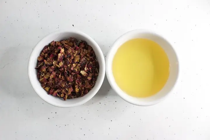 Moisturizing Rose Lotion Bars DIY Recipe 15 bowls of dried rose petals and carrier oil for making rose infused oil to use in diy rose lotion bars