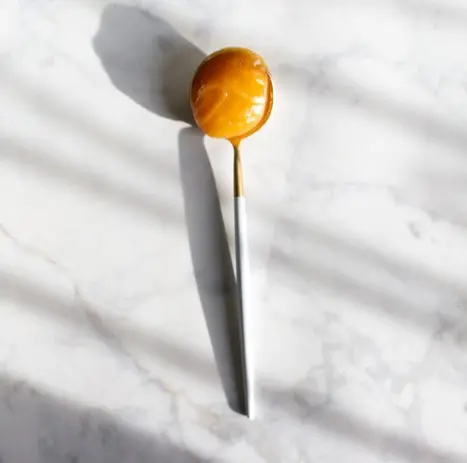 a spoon containing honey