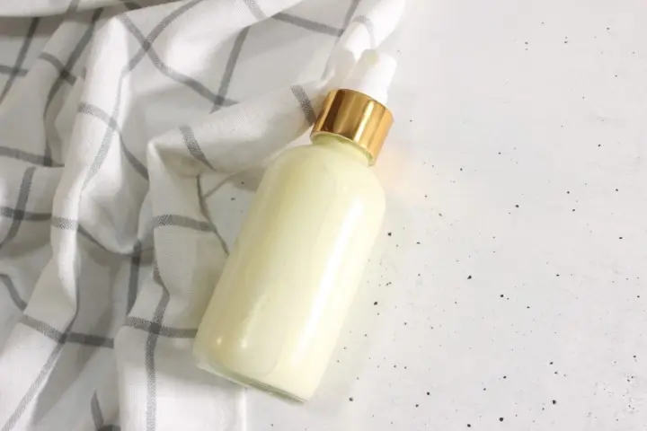 bottle of homemade sunscreen spray