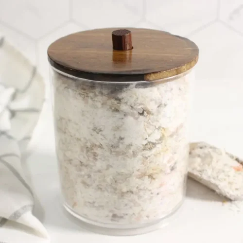 jar of homemade arnica bath soak for sore muscles