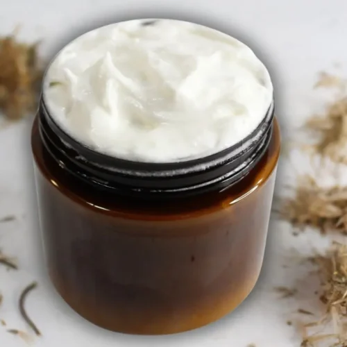 DIY Arnica Cream Recipe 8 jar of homemade arnica cream with dried arnica flowers