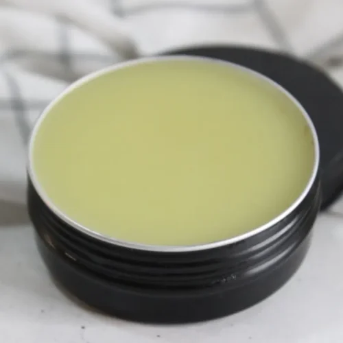 DIY Herbal Headache Relief Balm Recipe with Essential Oils 23 tin of homemade headache salve