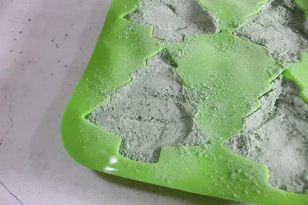 Charming Christmas Tree Bath Bombs Recipe 22 close up of Christmas Tree mold with bath bomb mixture in it