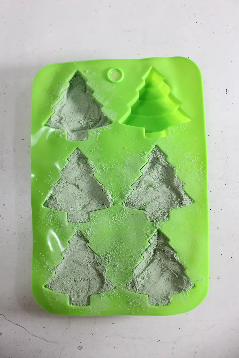 Charming Christmas Tree Bath Bombs Recipe 21 Christmas Tree mold with bath bomb mixture in it