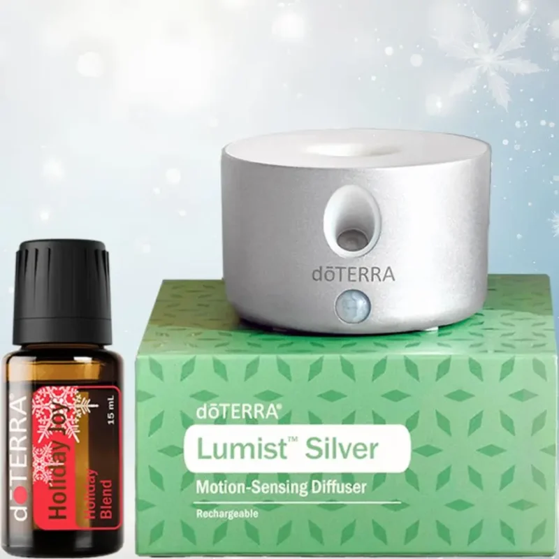 doterra lumist diffuser and holiday joy doterra lumist diffuser and bottle of holiday joy essential oil