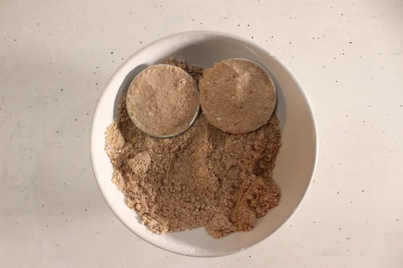 Rose Chocolate Bath Bomb Recipe 21 bath bomb molds in a bowl filled with chocolate bath bomb mixture