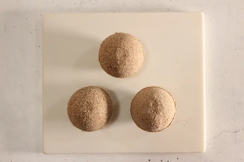 Rose Chocolate Bath Bomb Recipe 24 chocolate bath bombs drying on a tray