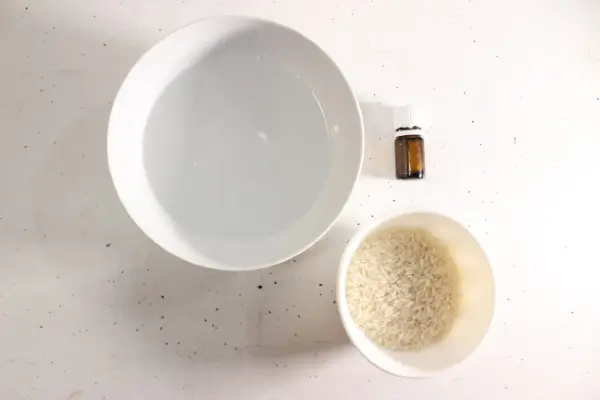 DIY Rice Face Mask for Glass Skin 13 bowls of rice, ingredients, and essential oil needed to make diy rice face mask