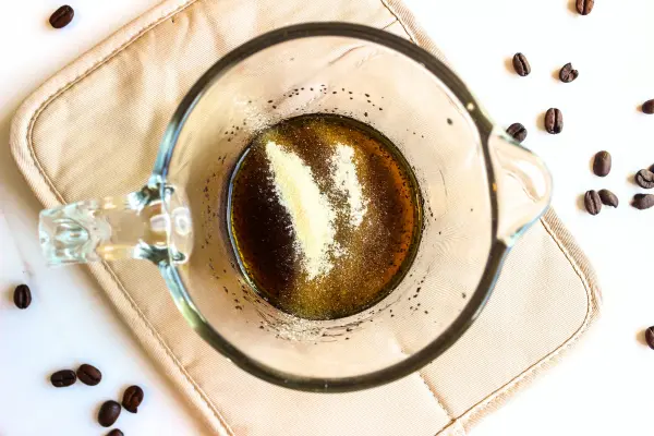 Under Eye Coffee Patches DIY Recipe 19 a bowl of coffee mixture with gelatin poured over the top of it for making diy coffee eye patches