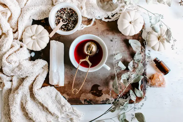 Calming Bedtime Tea Recipes For Sleep 32 cup of tea with infuser in it.