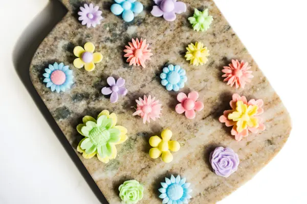 DIY Floral Soap Bars - an impressive handmade gift 29 a brown tray with colorful floral soaps