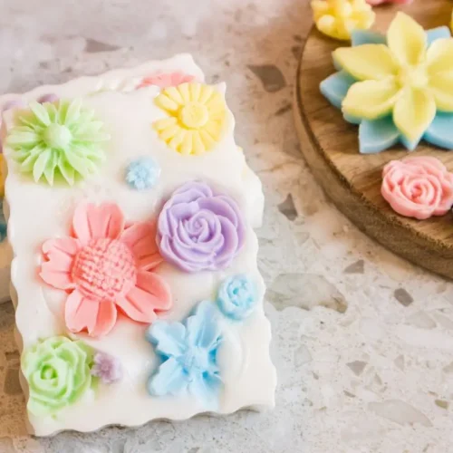 DIY Floral Soap Bars - an impressive handmade gift 24 bars of homemade soap with decorative floral pieces on them