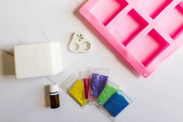 DIY Floral Soap Bars - an impressive handmade gift 13 soap molds, mica powders, essential oil and ingredients needed to make floral soap bars